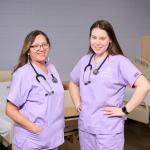 two nurses in scrubs