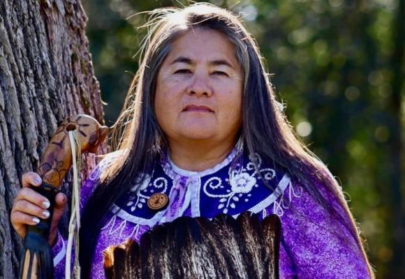 woman in traditional regalia