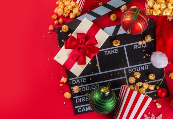 holiday movie slate with popcorn