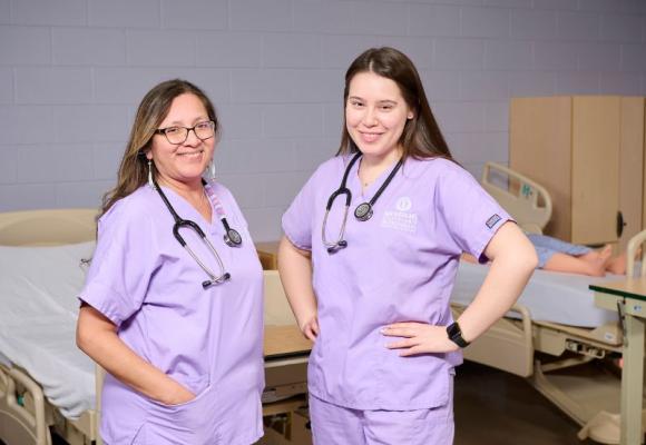 two nurses in scrubs