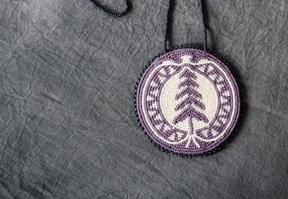 picture of a beaded crest logo