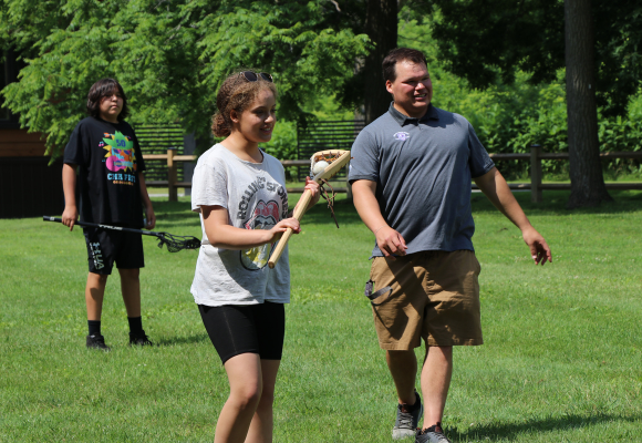 students playing lacrosse