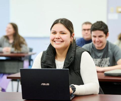 student smiling at camera