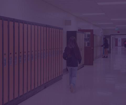 students walking down hallway