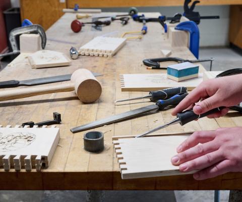 craftsman working with tools