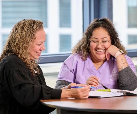 two students working at a table