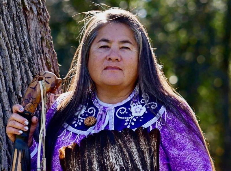 woman in traditional regalia