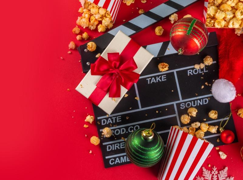 holiday movie slate with popcorn