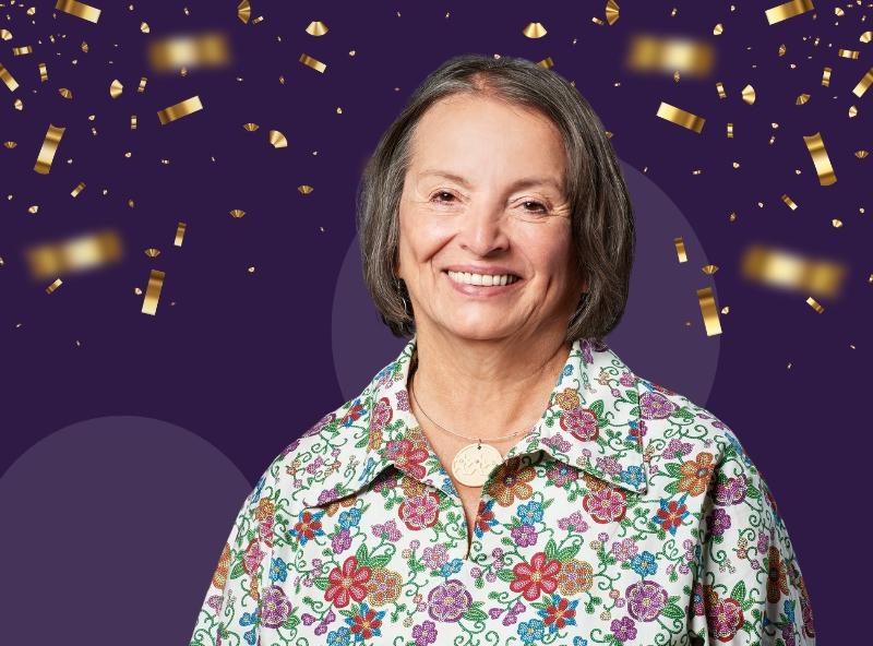 woman standing with confetti falling