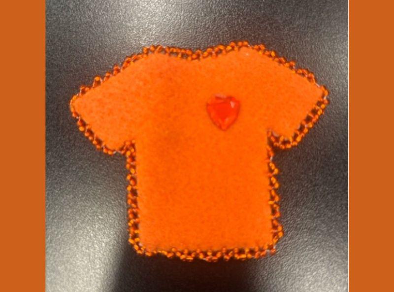 beaded orange shirt pin