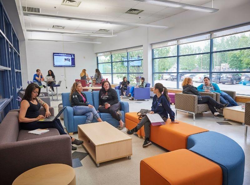 students seated in a lounge area