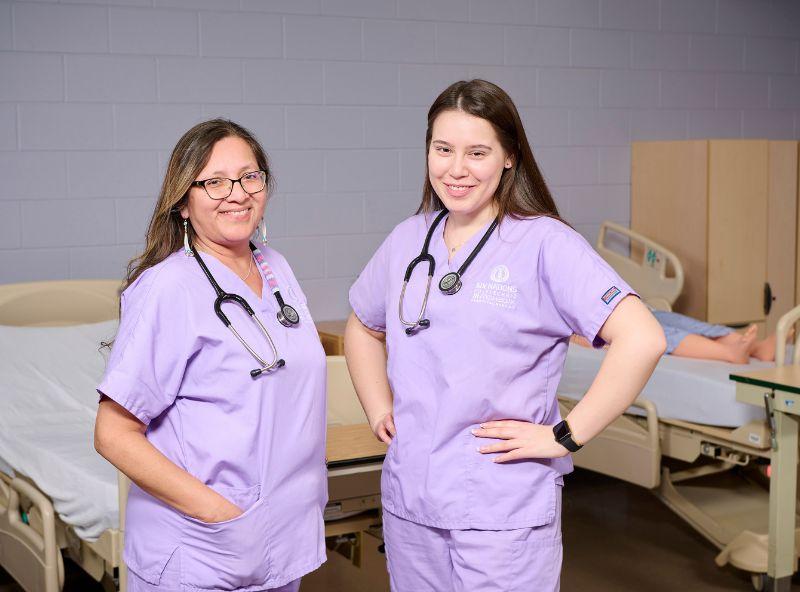 two nurses in scrubs