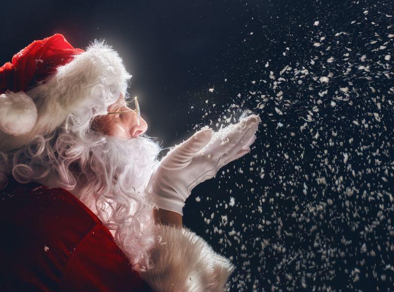 santa blowing snow